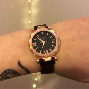 Rose gold watch with purple magnetic band